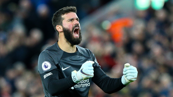 Alisson praises Liverpool's "sticking together" after a penalty save gives the Reds a win over West Ham.